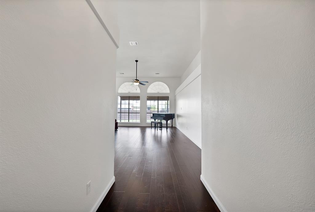 5418 Highgate Lane Rowlett, TX 75088 - Photo 9 of 36 a view of empty room with wooden floor