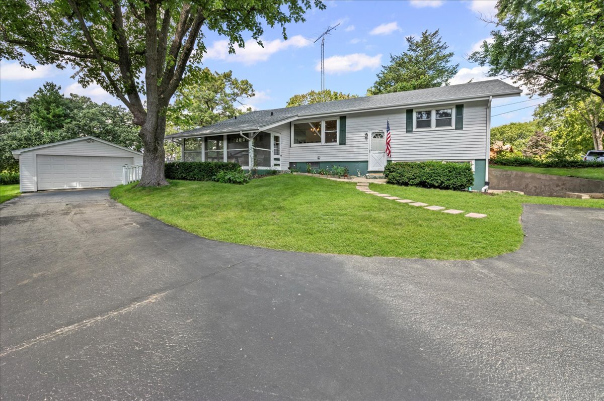 4615 Blue Jay Road Harvard, IL 60033 - Photo 26 of 30 front view of a house with a yard