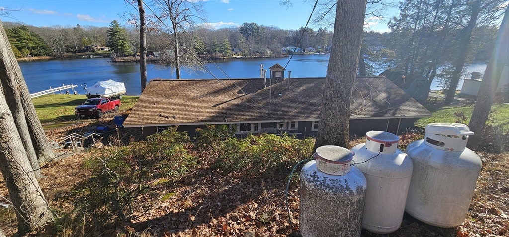 89 Jolicoeur Avenue, Unit 1 Spencer, MA 01562 - Photo 11 of 13 a view of yard and tree s