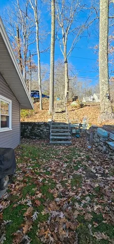 a view of a yard with an outdoor space