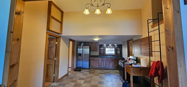 a view of an entryway with a livingroom