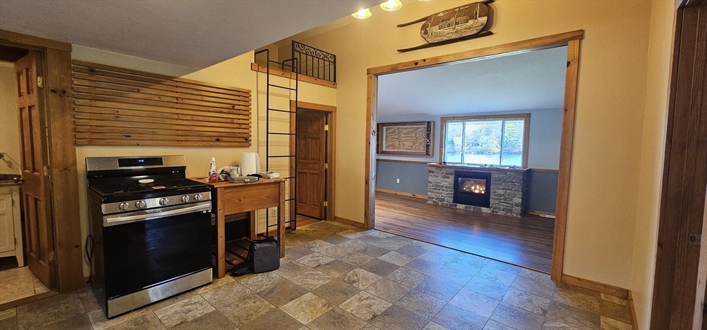 89 Jolicoeur Avenue, Unit 1 Spencer, MA 01562 - Photo 4 of 13 a kitchen with sink and refrigerator