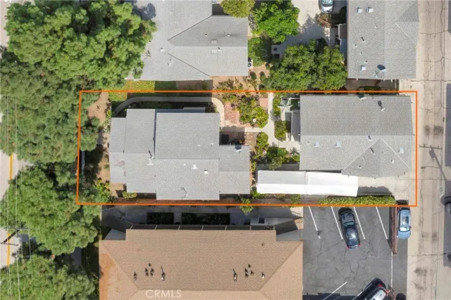 an aerial view of a house with swimming pool