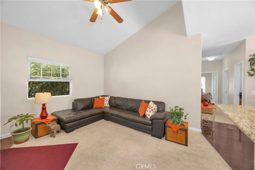 7612 Pickering Avenue Whittier, CA 90602 - Photo 35 of 53 a living room with furniture and a window