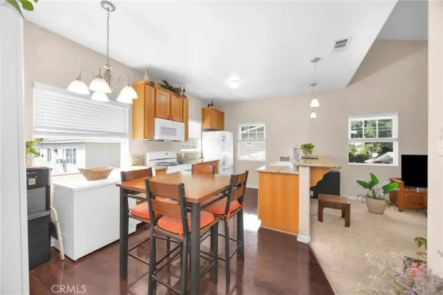 a bedroom with furniture and ceiling fan