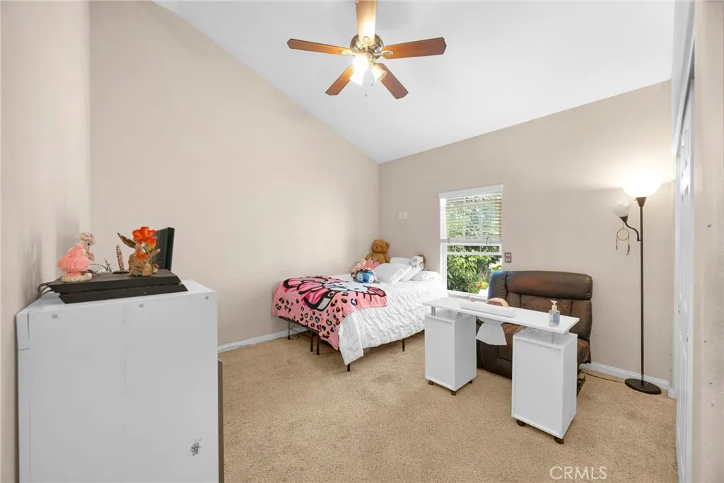 7612 Pickering Avenue Whittier, CA 90602 - Photo 43 of 53 a bedroom with furniture and ceiling fan