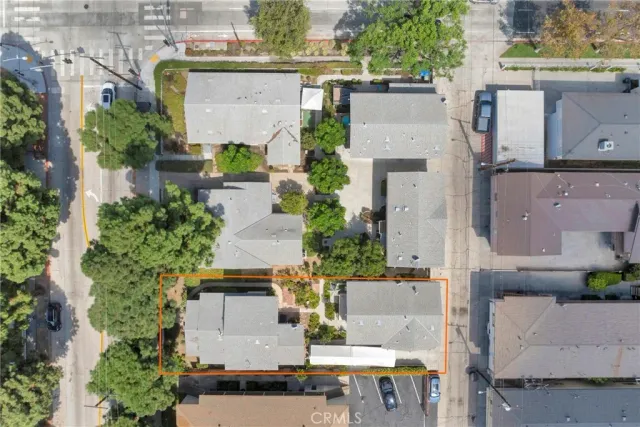 an aerial view of a house with swimming pool