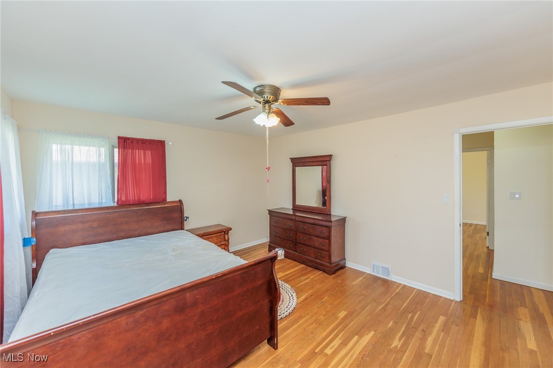 5445 Hauserman Road Cleveland, OH 44130 - Photo 21 of 45 Bedroom 1 with ceiling fan and light wood-type flooring