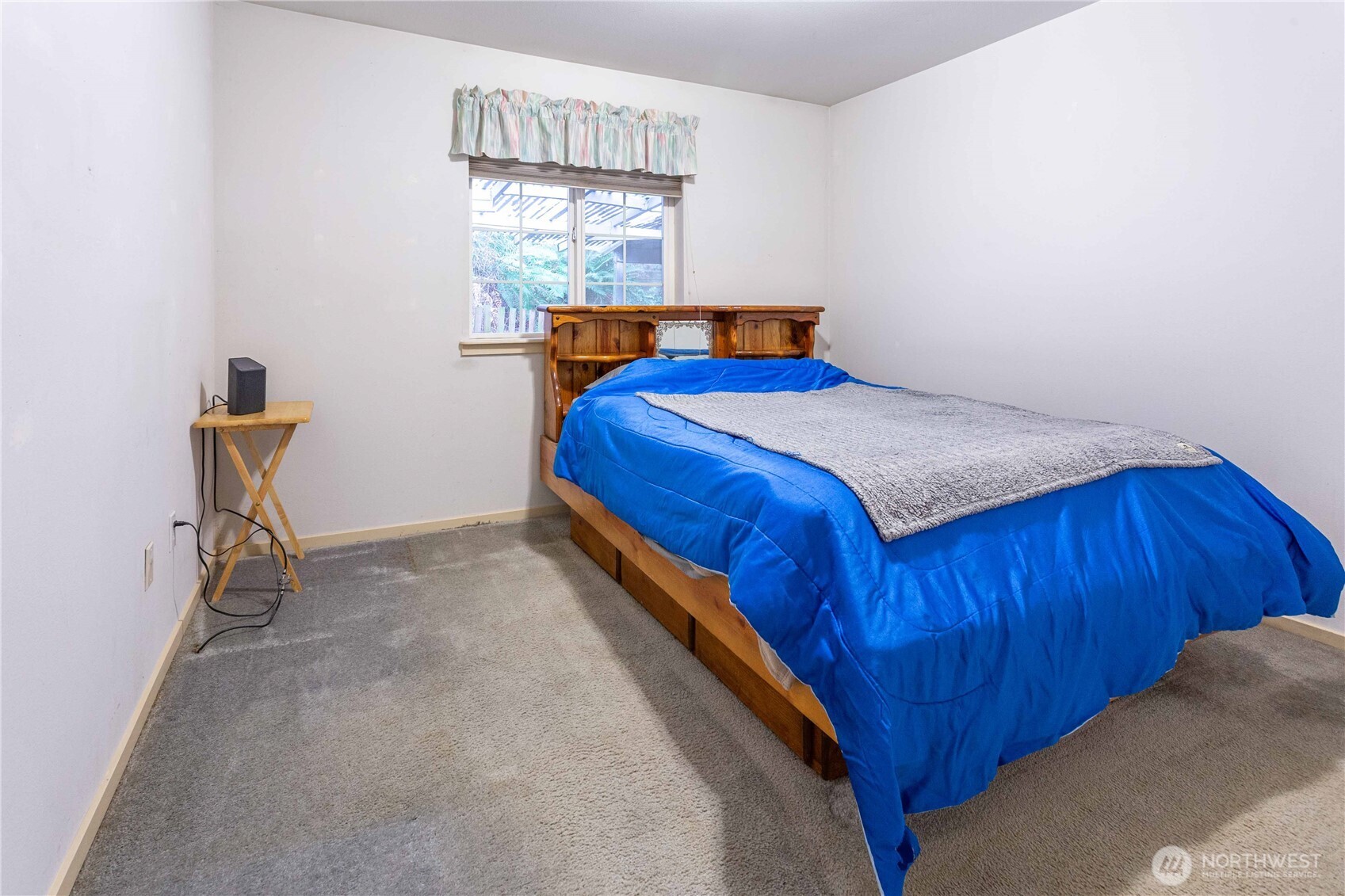 396 Sudden Valley Drive Bellingham, WA 98229 - Photo 15 of 28 a bedroom with a bed and window