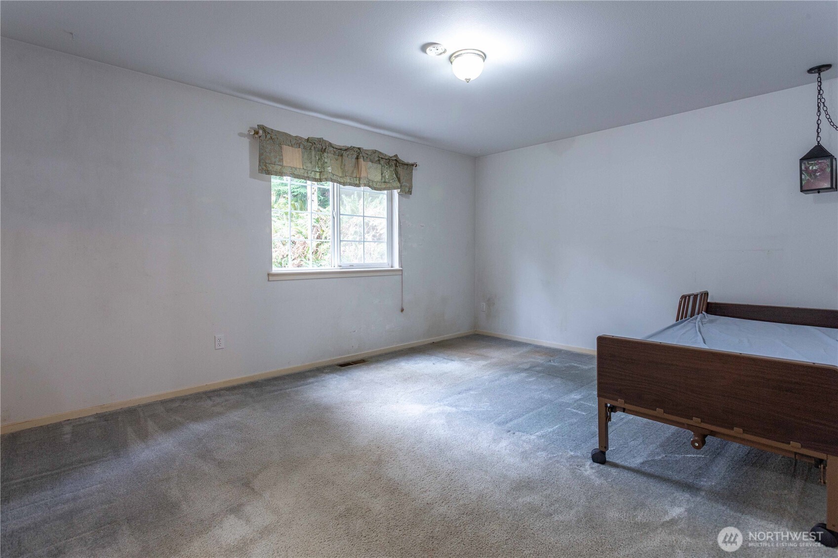 396 Sudden Valley Drive Bellingham, WA 98229 - Photo 17 of 28 an empty room with windows