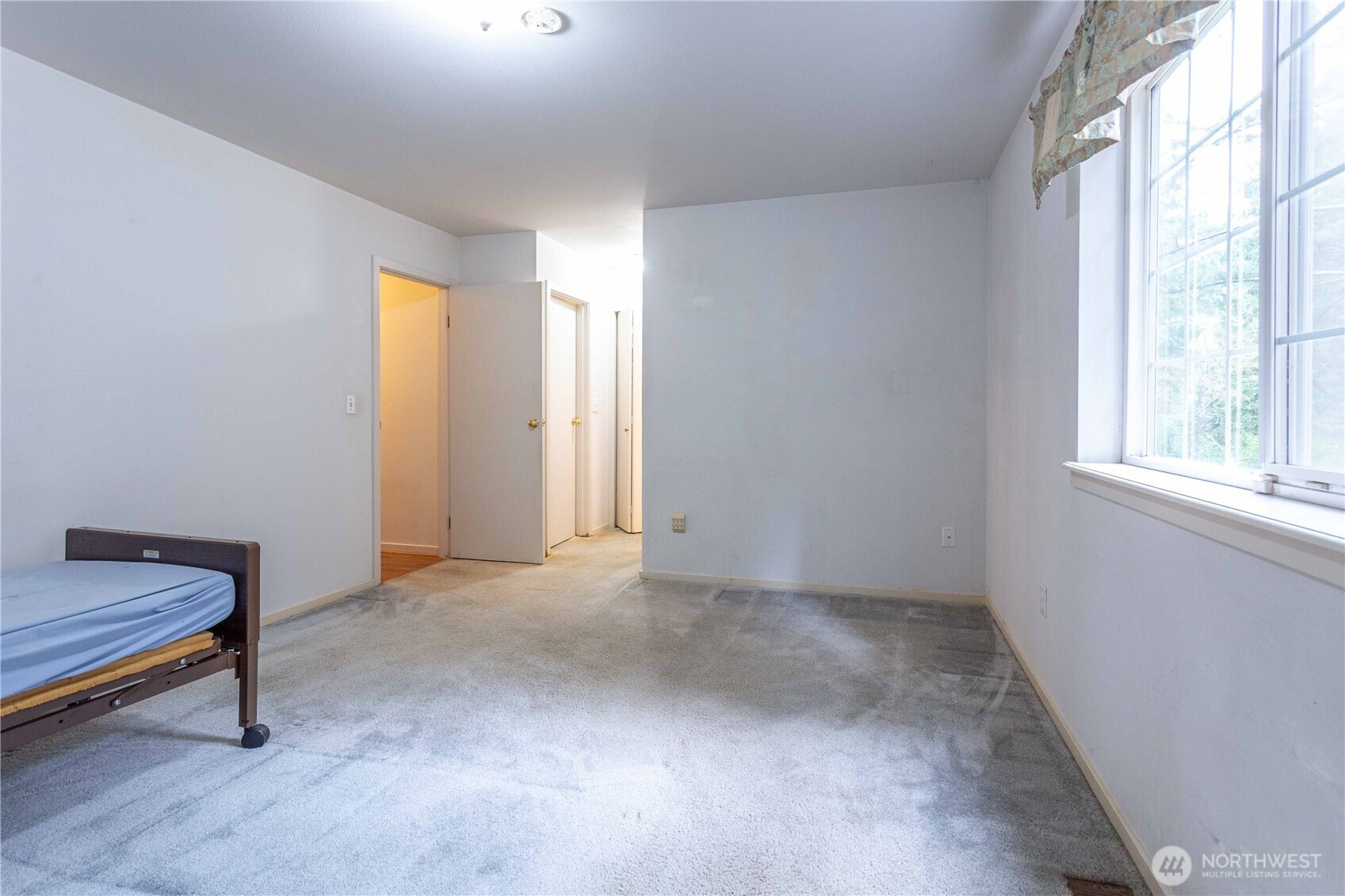 396 Sudden Valley Drive Bellingham, WA 98229 - Photo 18 of 28 a view of an empty room with a window