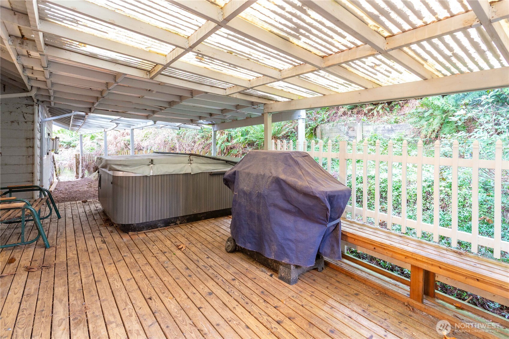 396 Sudden Valley Drive Bellingham, WA 98229 - Photo 26 of 28 a living room with a couch and wooden floor