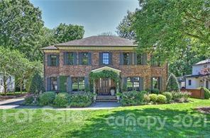 3115 Wickersham Road Charlotte, NC 28211 - Photo 1 of 1 a front view of a house with a garden