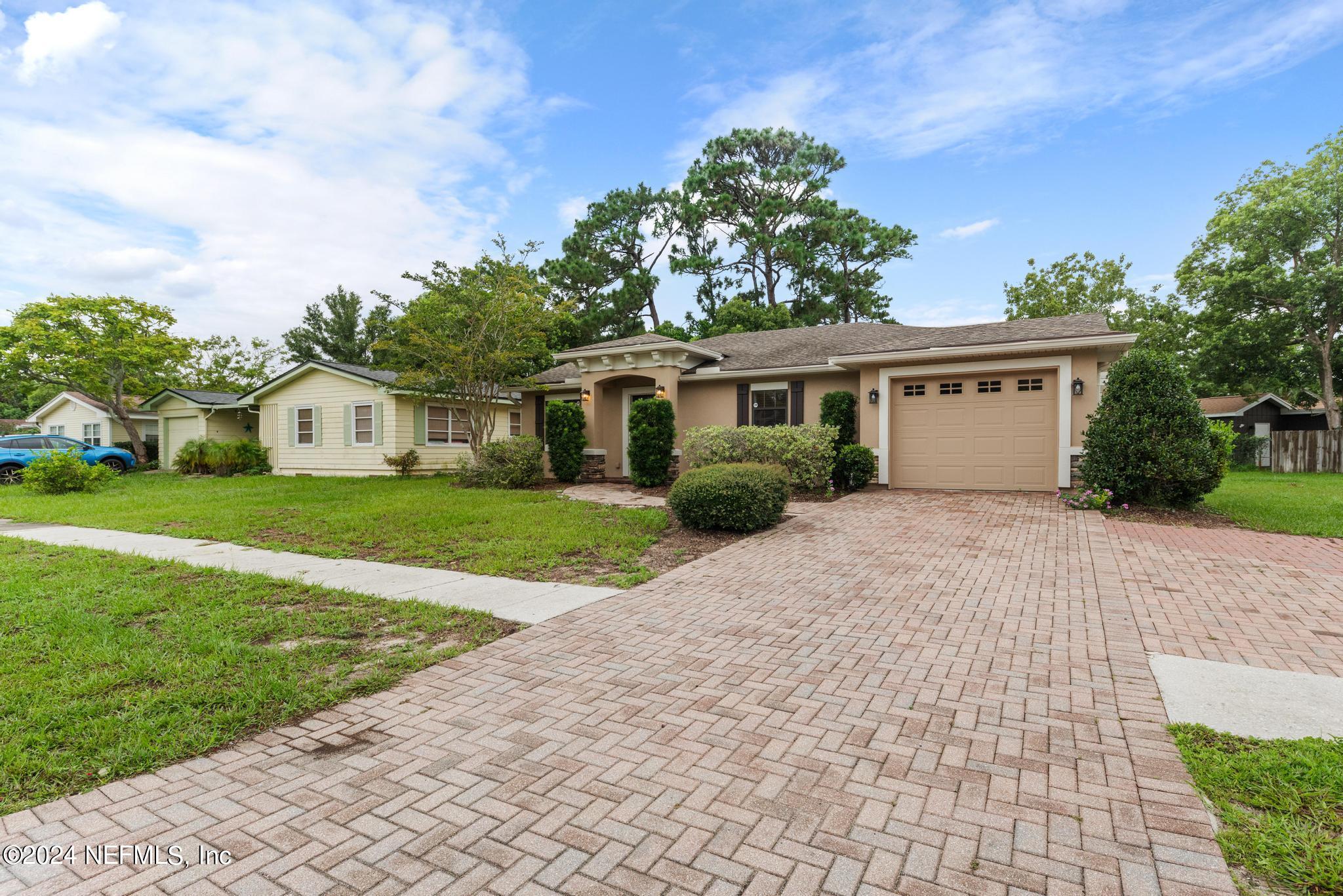 218 Lily Road St. Augustine, FL 32086 - Photo 3 of 28 a front view of house with yard and green space