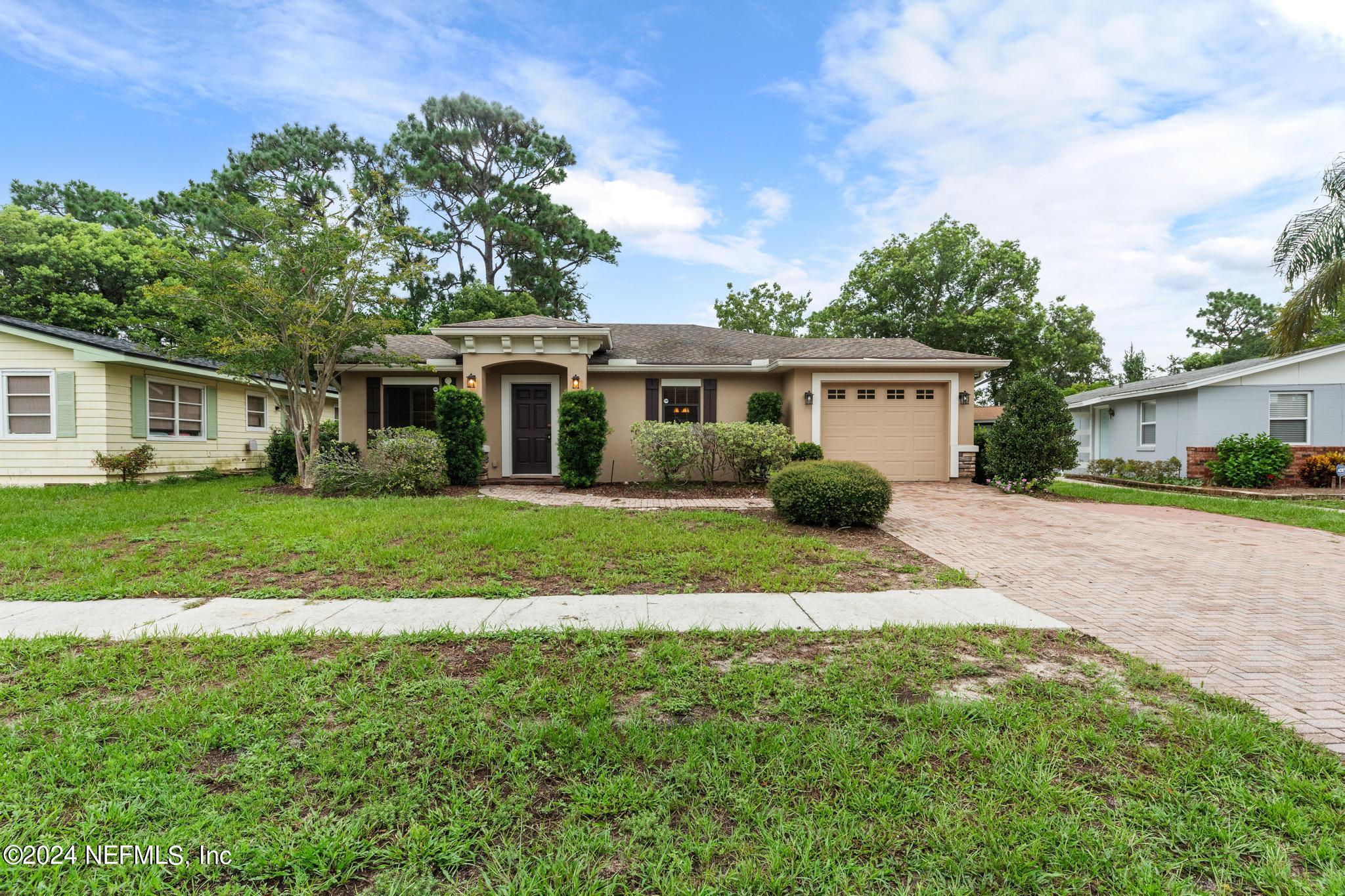 218 Lily Road St. Augustine, FL 32086 - Photo 4 of 28 a front view of house with yard and green space
