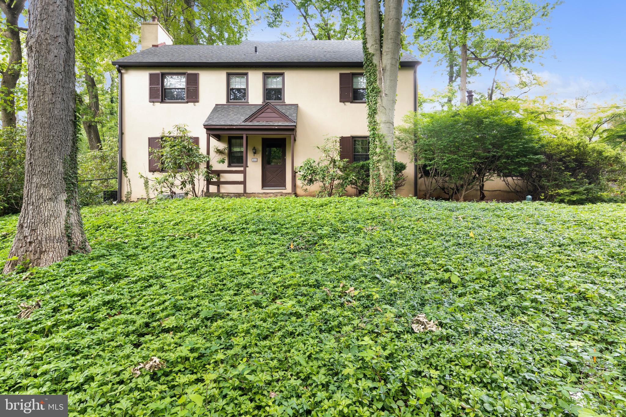 Front, sits back from road.