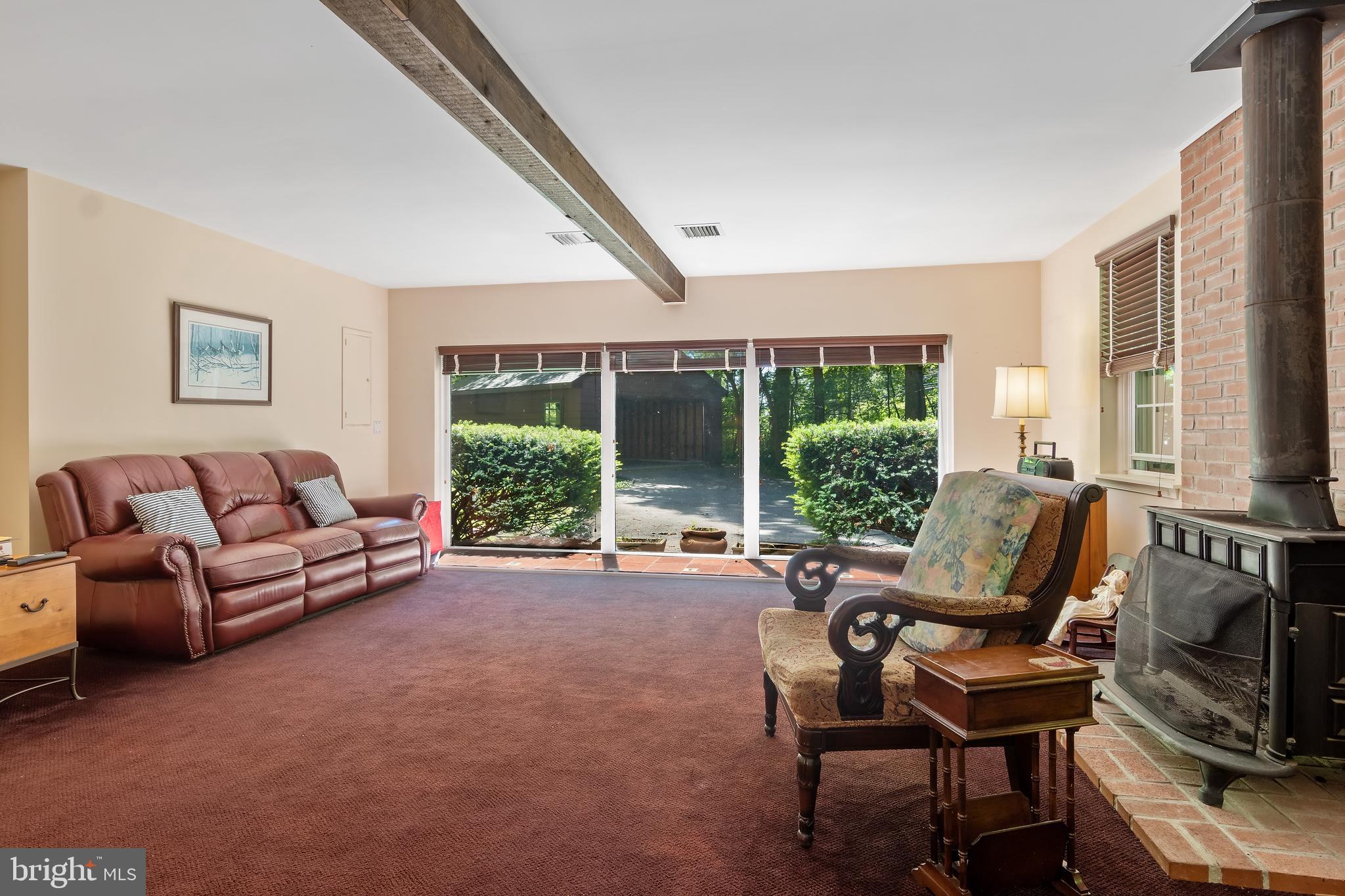 466 Upper Gulph Road Wayne, PA 19087 - Photo 8 of 29 Family room with wood burning stove