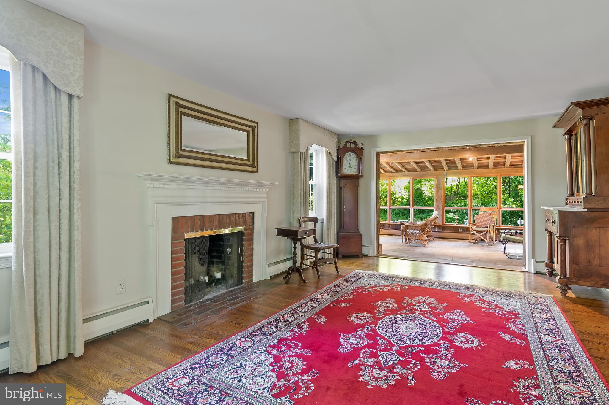 466 Upper Gulph Road Wayne, PA 19087 - Photo 9 of 29 Living room with wood burning fireplace