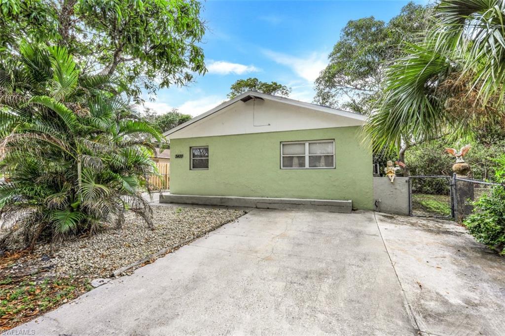 3400 Canal Street Naples, FL 34112 - Photo 24 of 32 a view of a backyard of a house