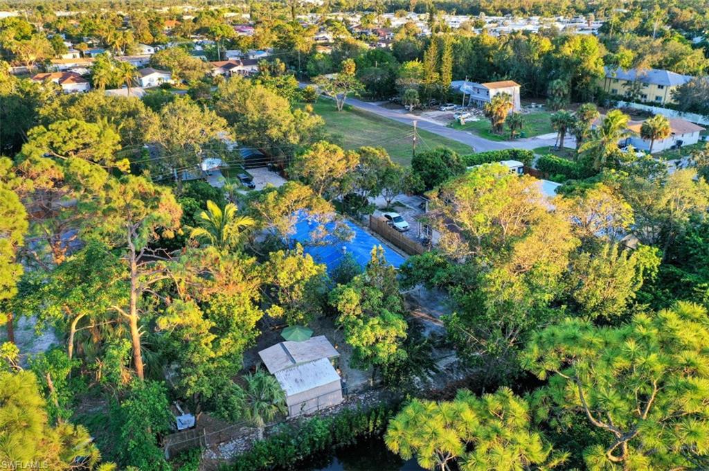 3400 Canal Street Naples, FL 34112 - Photo 29 of 32 an aerial view of residential house with outdoor space