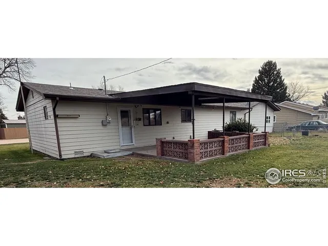 a view of a backyard with a garden