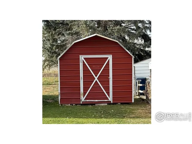 a view of a backyard of a house