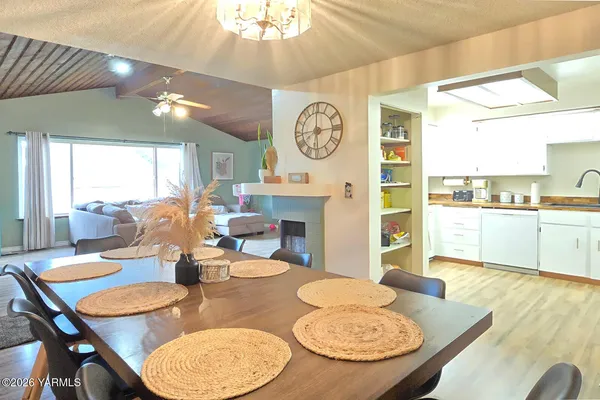 a bedroom with furniture and a chandelier