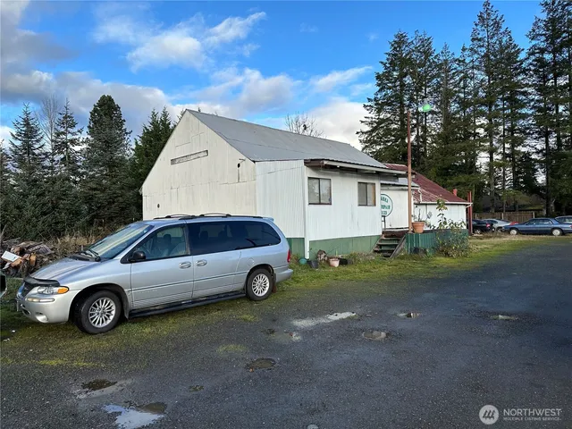 a car parked in front of a house