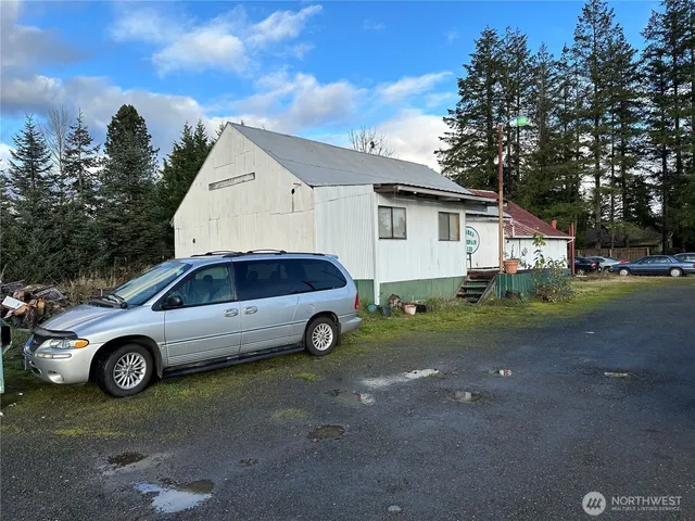 a car parked in front of a house