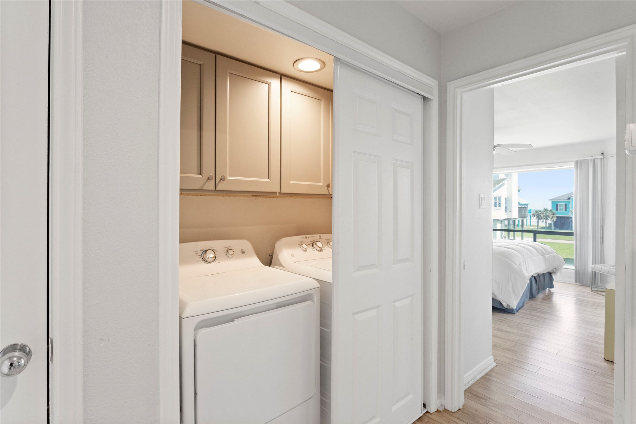 17627 Termini-San Luis Pass Road Galveston, TX 77554 - Photo 18 of 28 Full sized washer/dryer conveniently located on same floor as both bedrooms, and just inside the entry