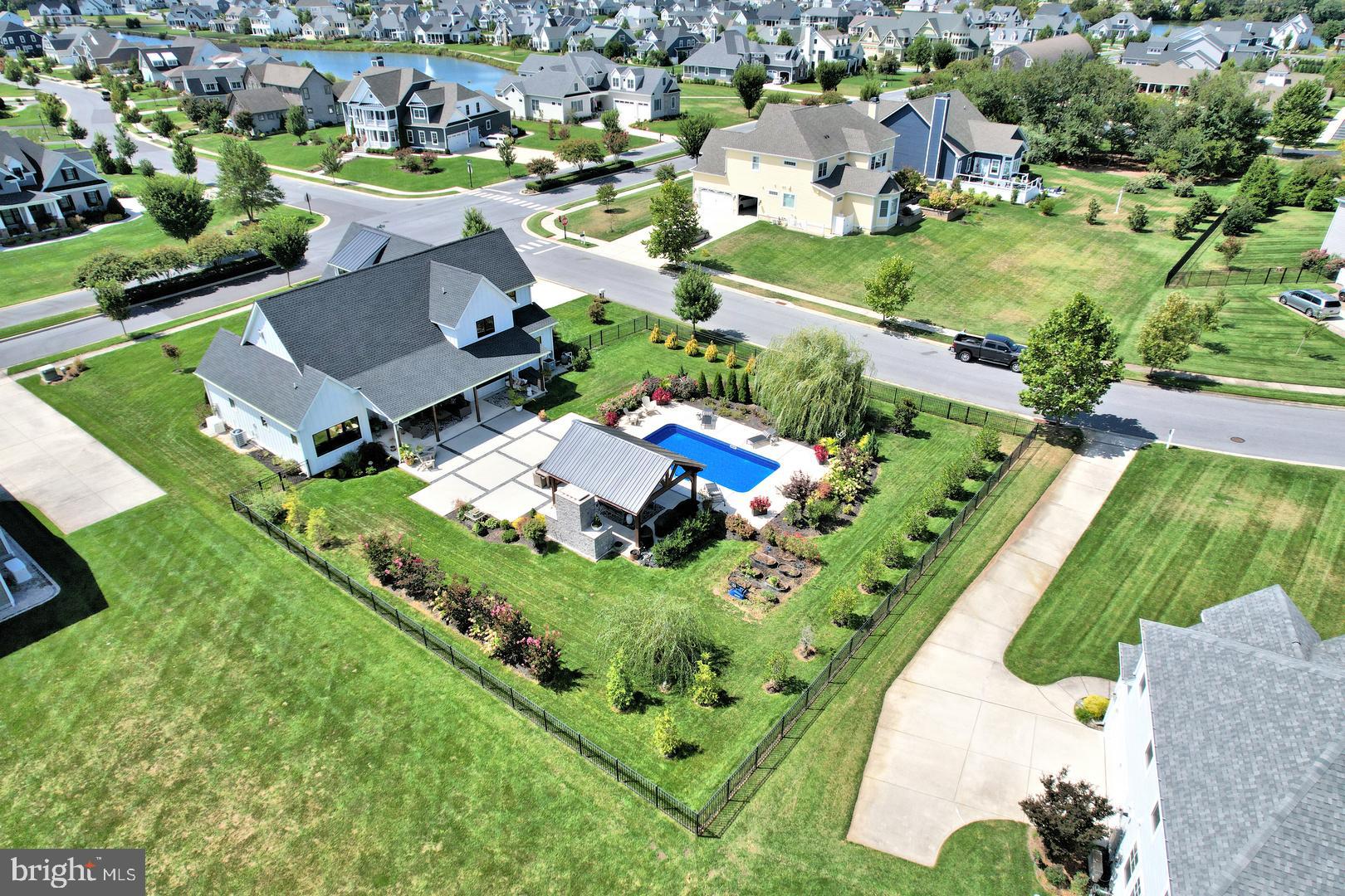 30921 Stallion Lane Lewes, DE 19958 - Photo 13 of 65 an aerial view of a house with a garden