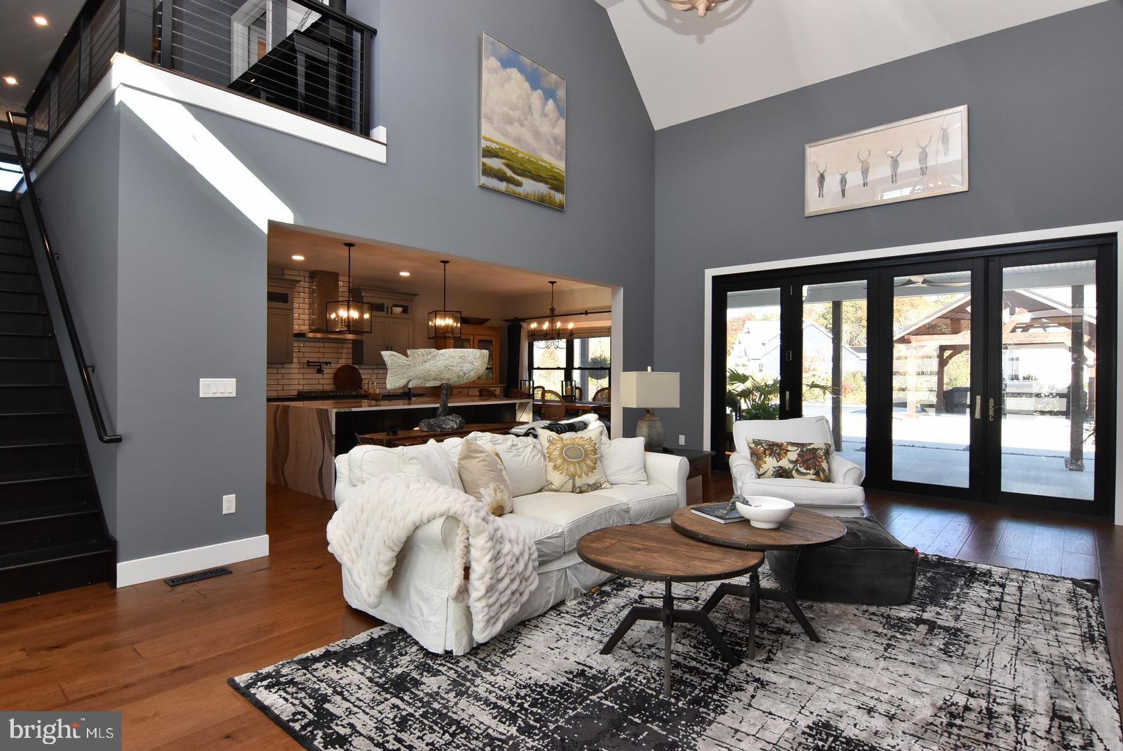30921 Stallion Lane Lewes, DE 19958 - Photo 21 of 65 a living room with furniture and a table
