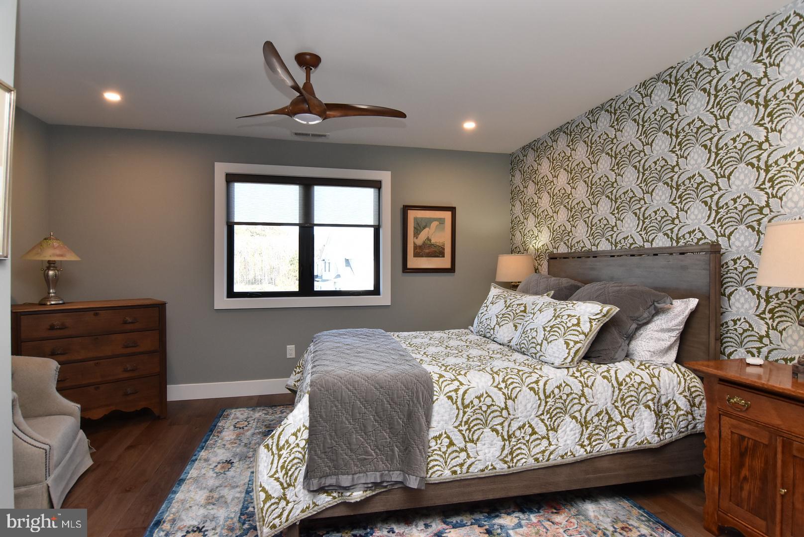 30921 Stallion Lane Lewes, DE 19958 - Photo 48 of 65 a bedroom with a bed and a window