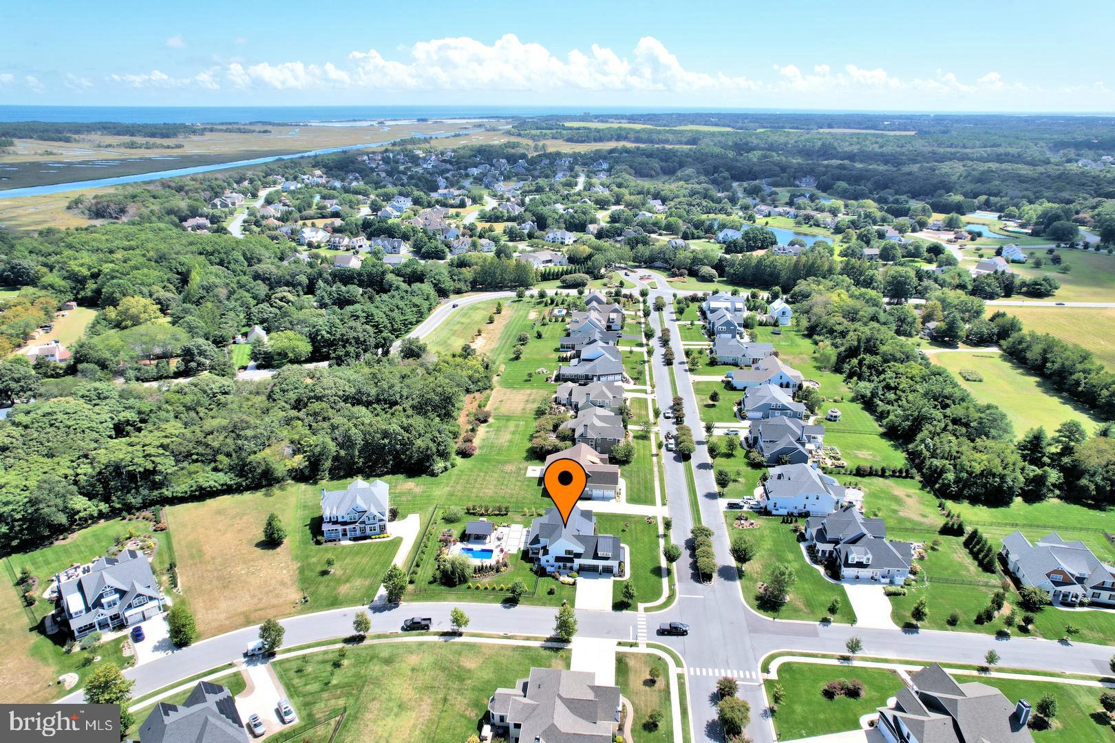 30921 Stallion Lane Lewes, DE 19958 - Photo 61 of 65 an aerial view of residential houses with outdoor space and ocean view