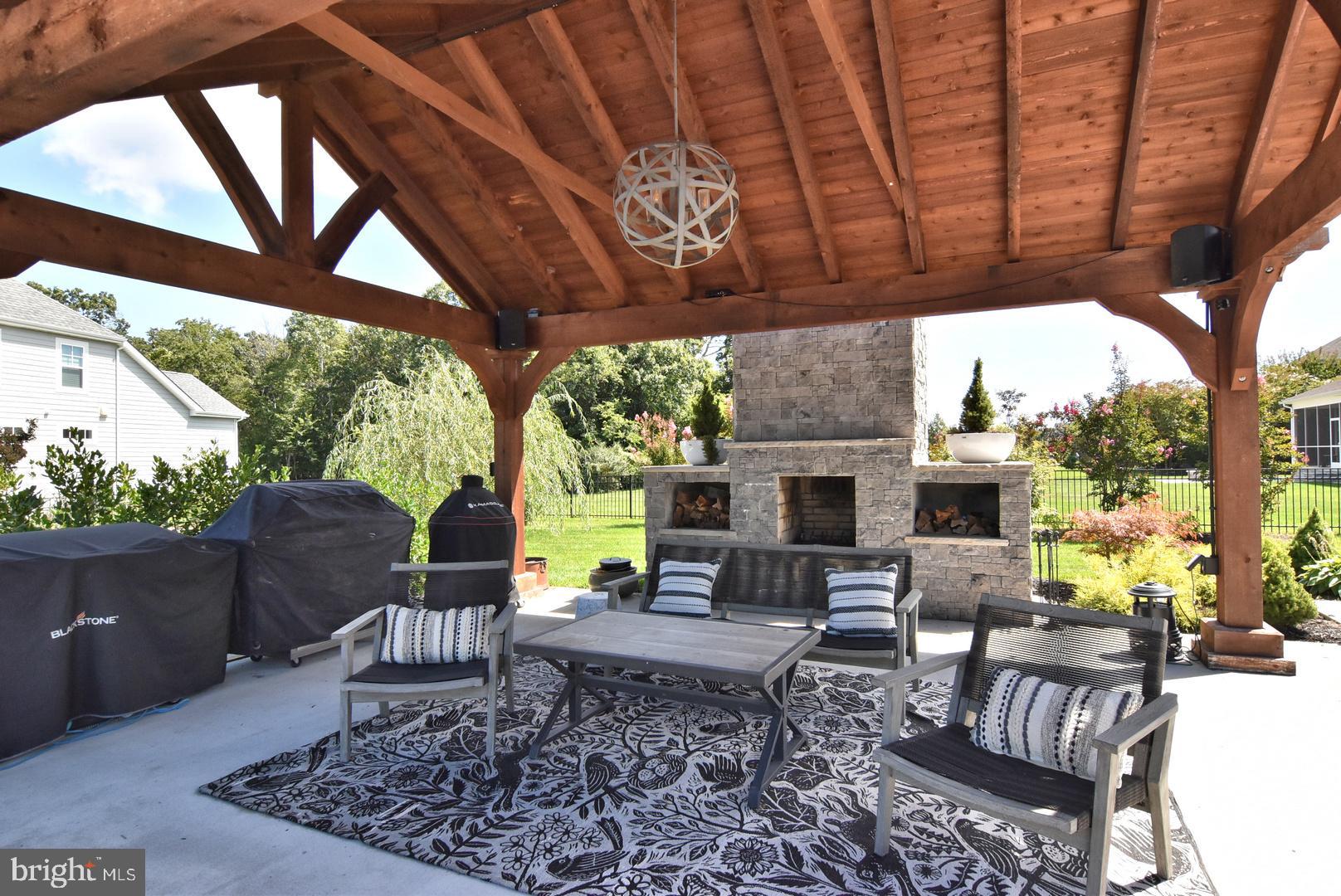 30921 Stallion Lane Lewes, DE 19958 - Photo 10 of 65 a outdoor living space with furniture and garden view