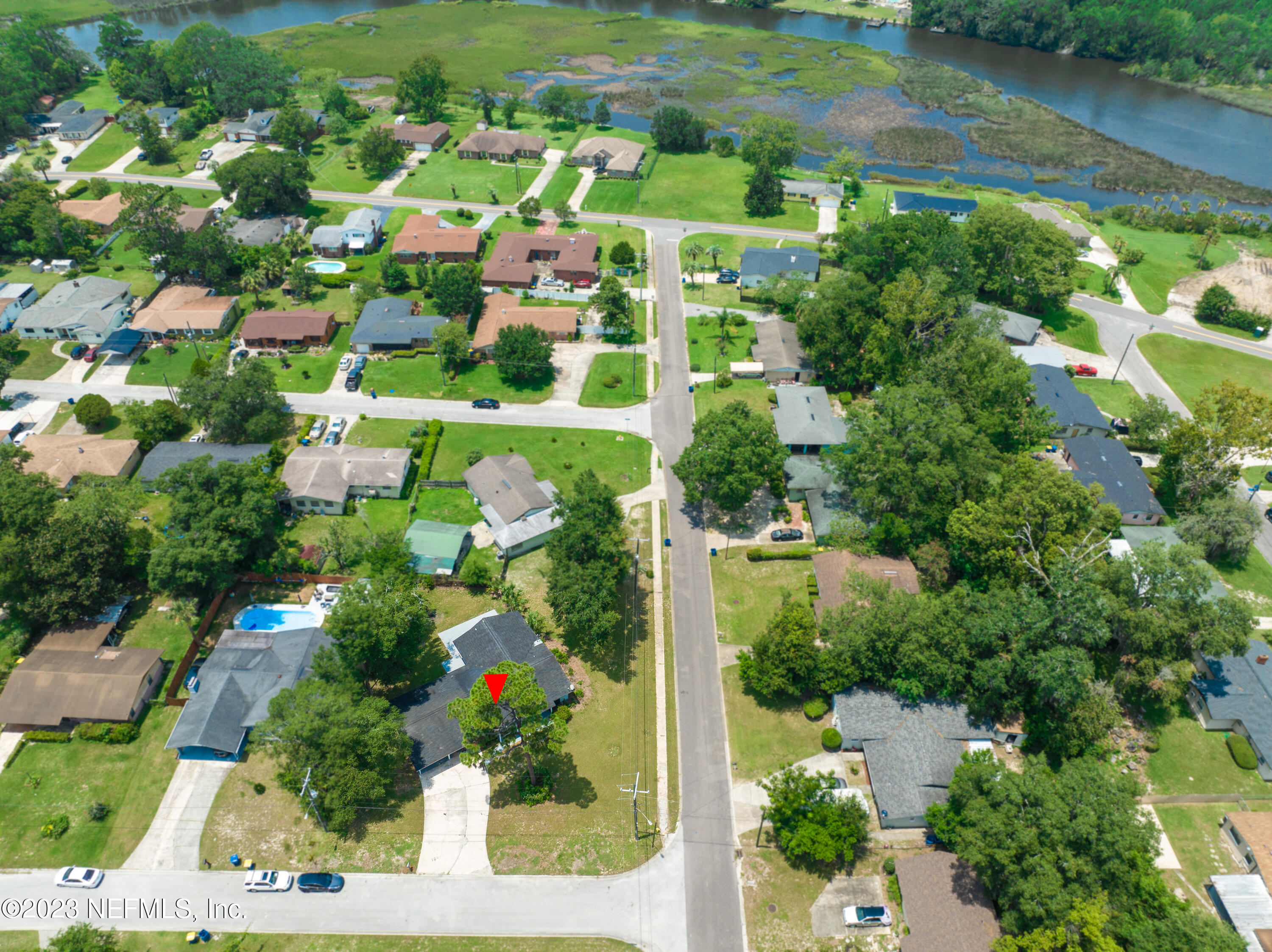 6958 Champlain Road Jacksonville, FL 32208 - Photo 2 of 34 an aerial view of a residential houses with yard and street view