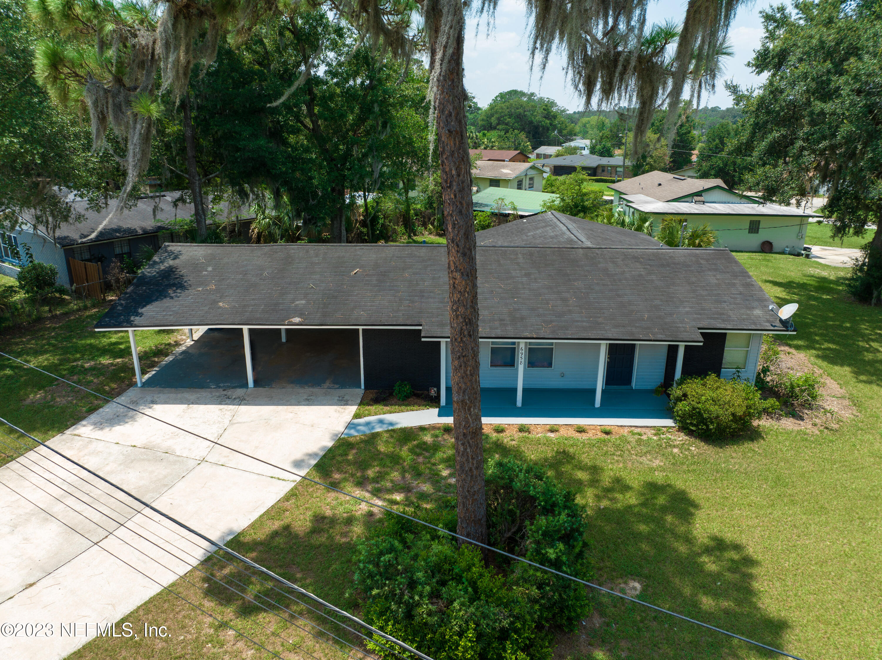 6958 Champlain Road Jacksonville, FL 32208 - Photo 3 of 34 front view of a house with a yard