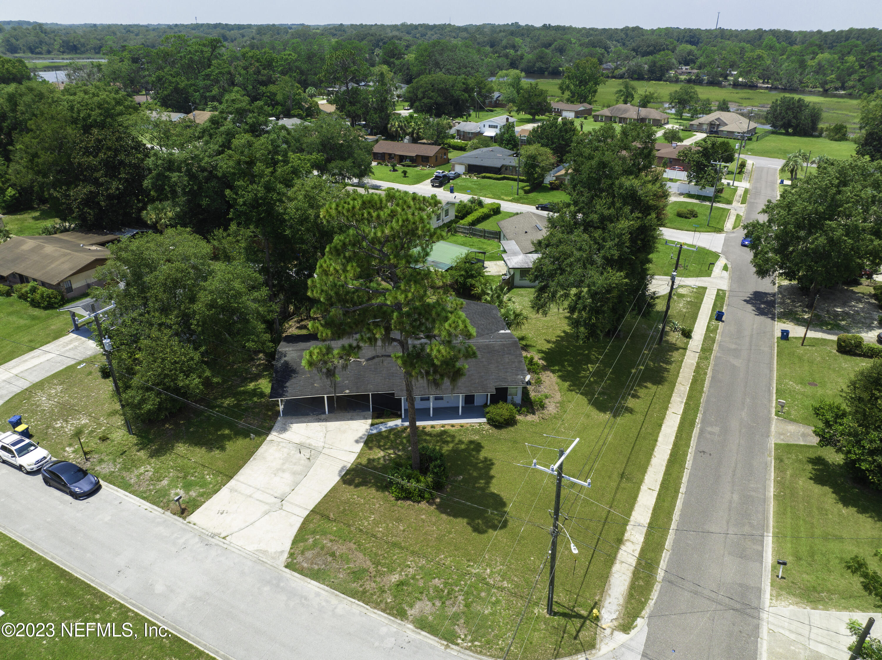 6958 Champlain Road Jacksonville, FL 32208 - Photo 34 of 34 an aerial view of a house with yard