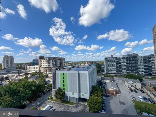 a room with lots of chairs and mirrors