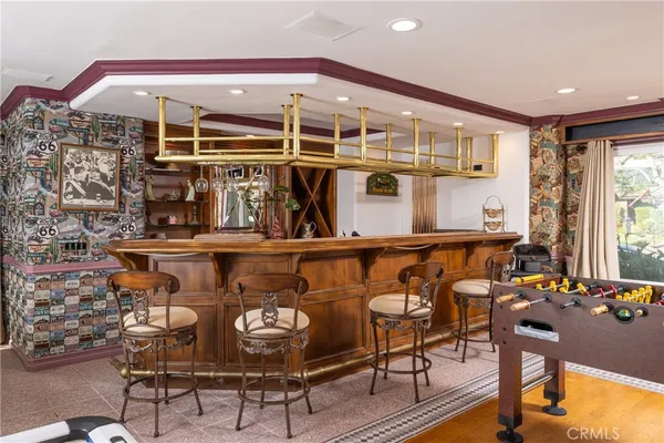 a spacious bathroom with a granite countertop tub sink shower and mirror