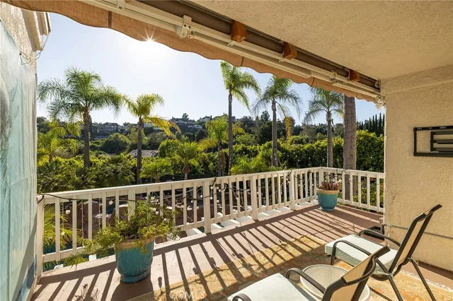 a bedroom with a bed and a mirror