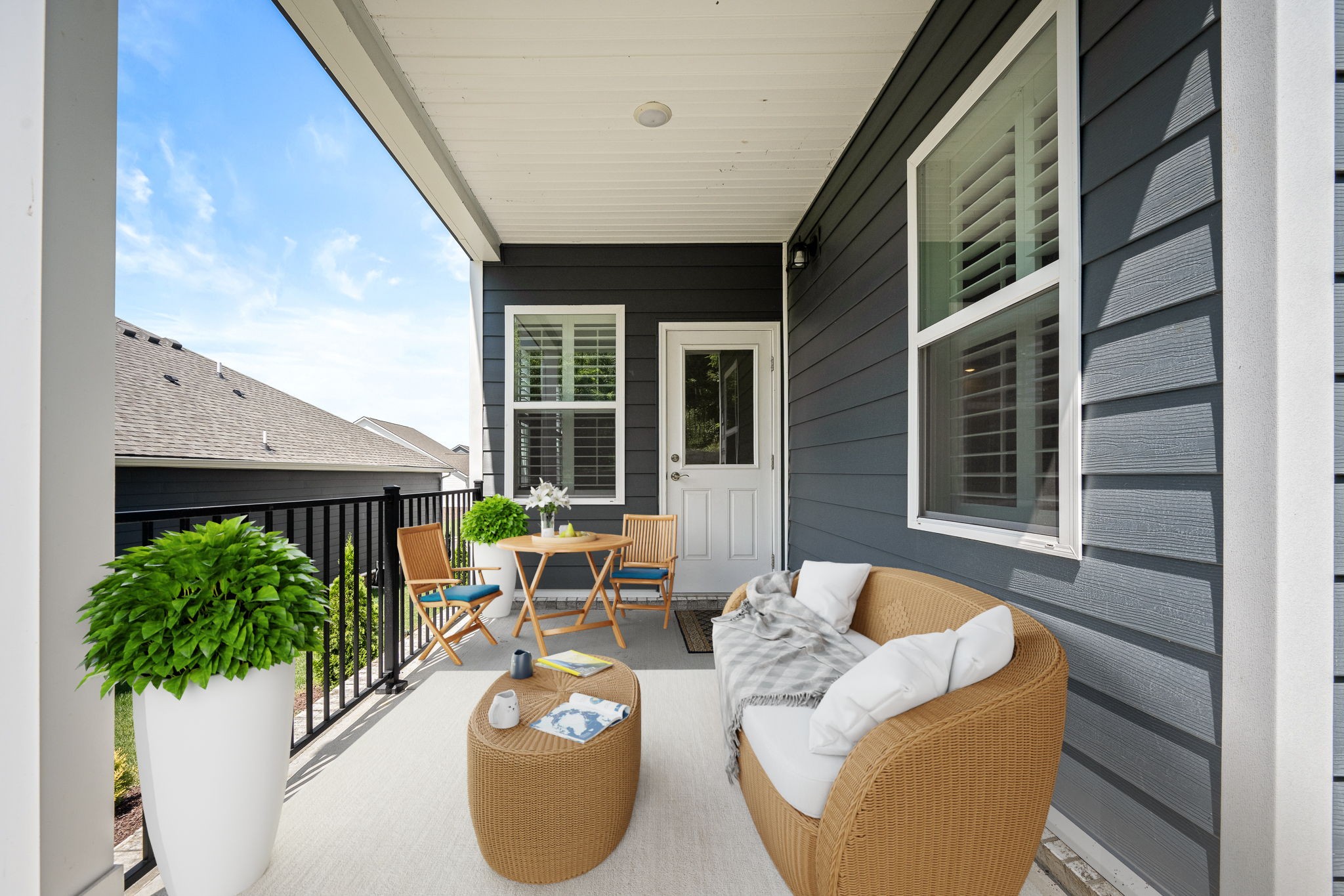3250 Hearth Hollow Road Columbia, TN 38401 - Photo 15 of 36 a view of a patio with couches table and chairs and potted plants