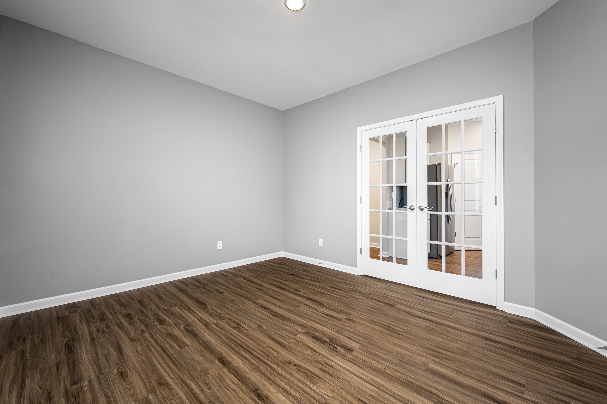 3250 Hearth Hollow Road Columbia, TN 38401 - Photo 26 of 36 a view of an empty room with wooden floor and a window