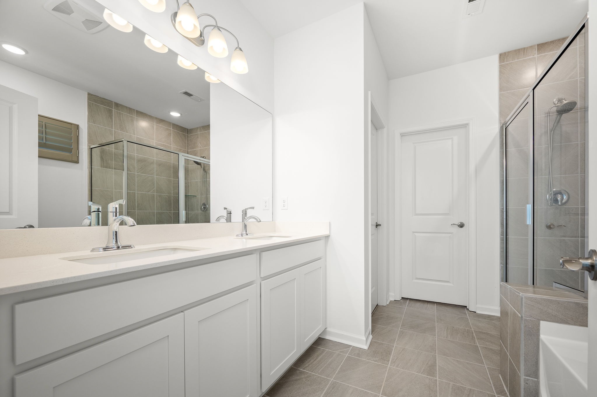 3250 Hearth Hollow Road Columbia, TN 38401 - Photo 28 of 36 a bathroom with a sink double vanity and a mirror