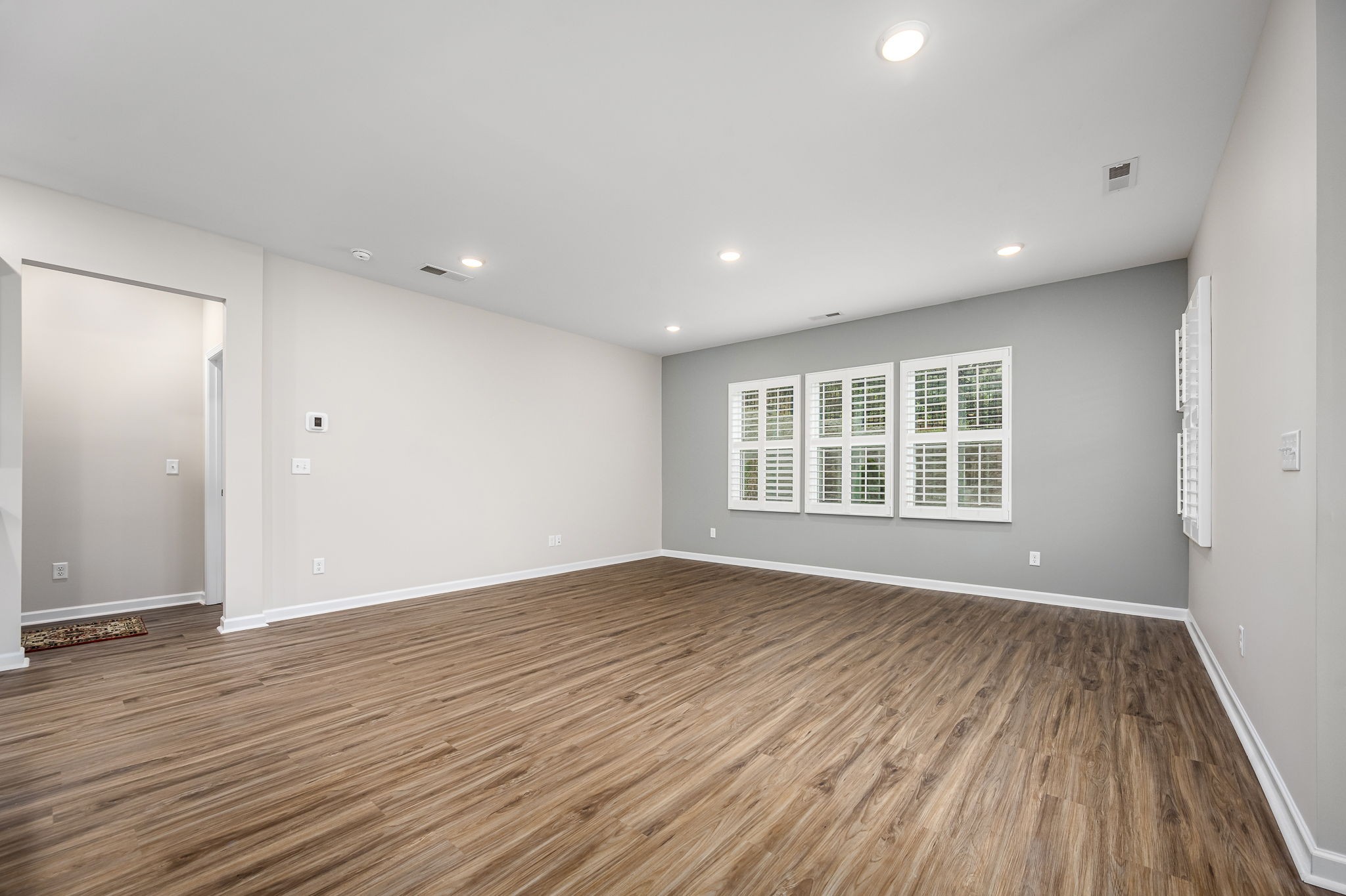 3250 Hearth Hollow Road Columbia, TN 38401 - Photo 32 of 36 a view of an empty room with wooden floor and a window