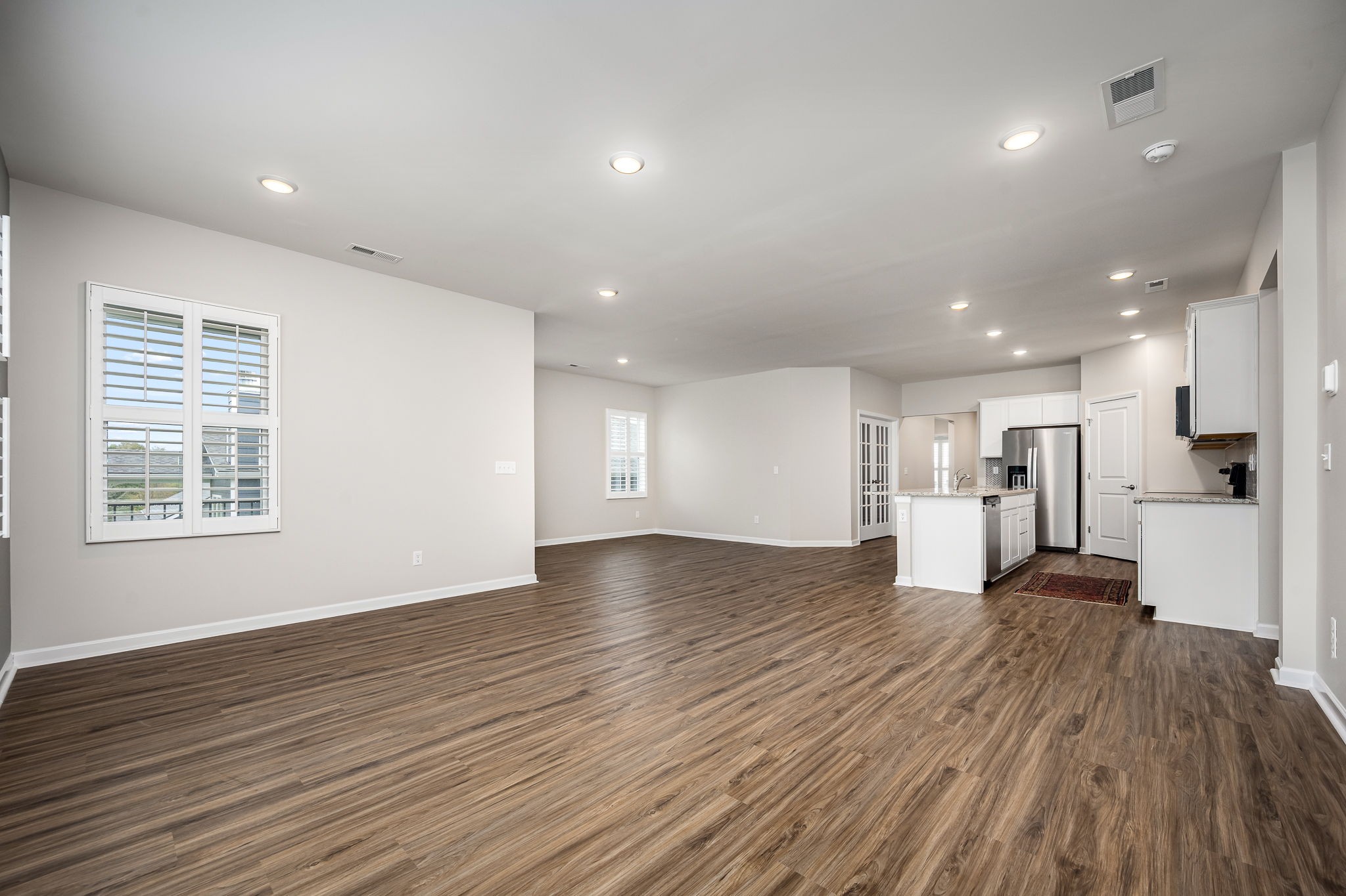 3250 Hearth Hollow Road Columbia, TN 38401 - Photo 35 of 36 a view of empty room with wooden floor and windows
