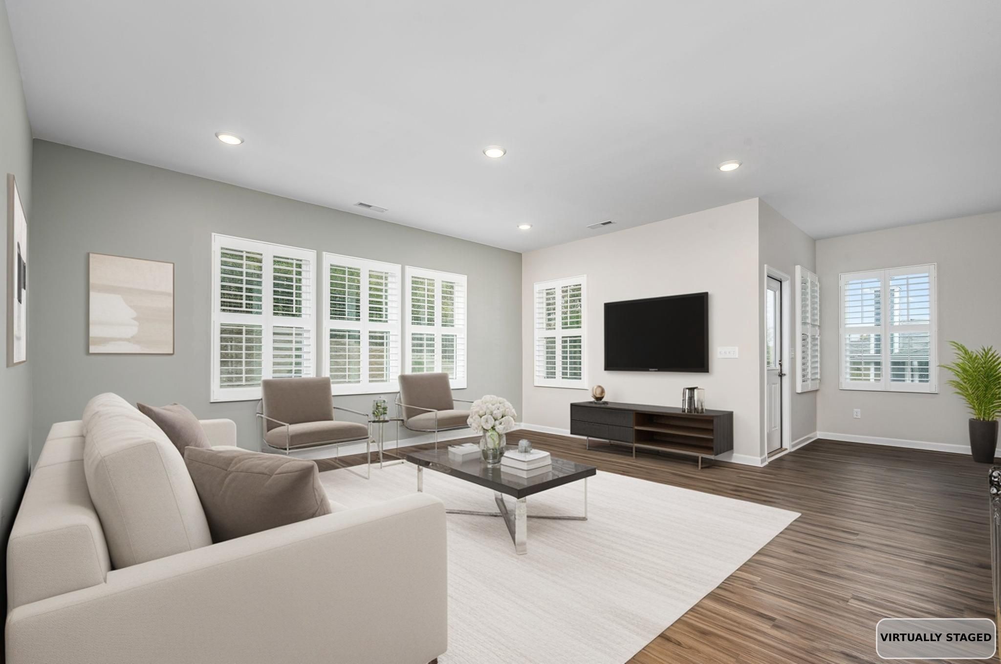 3250 Hearth Hollow Road Columbia, TN 38401 - Photo 4 of 36 a living room with furniture and a flat screen tv