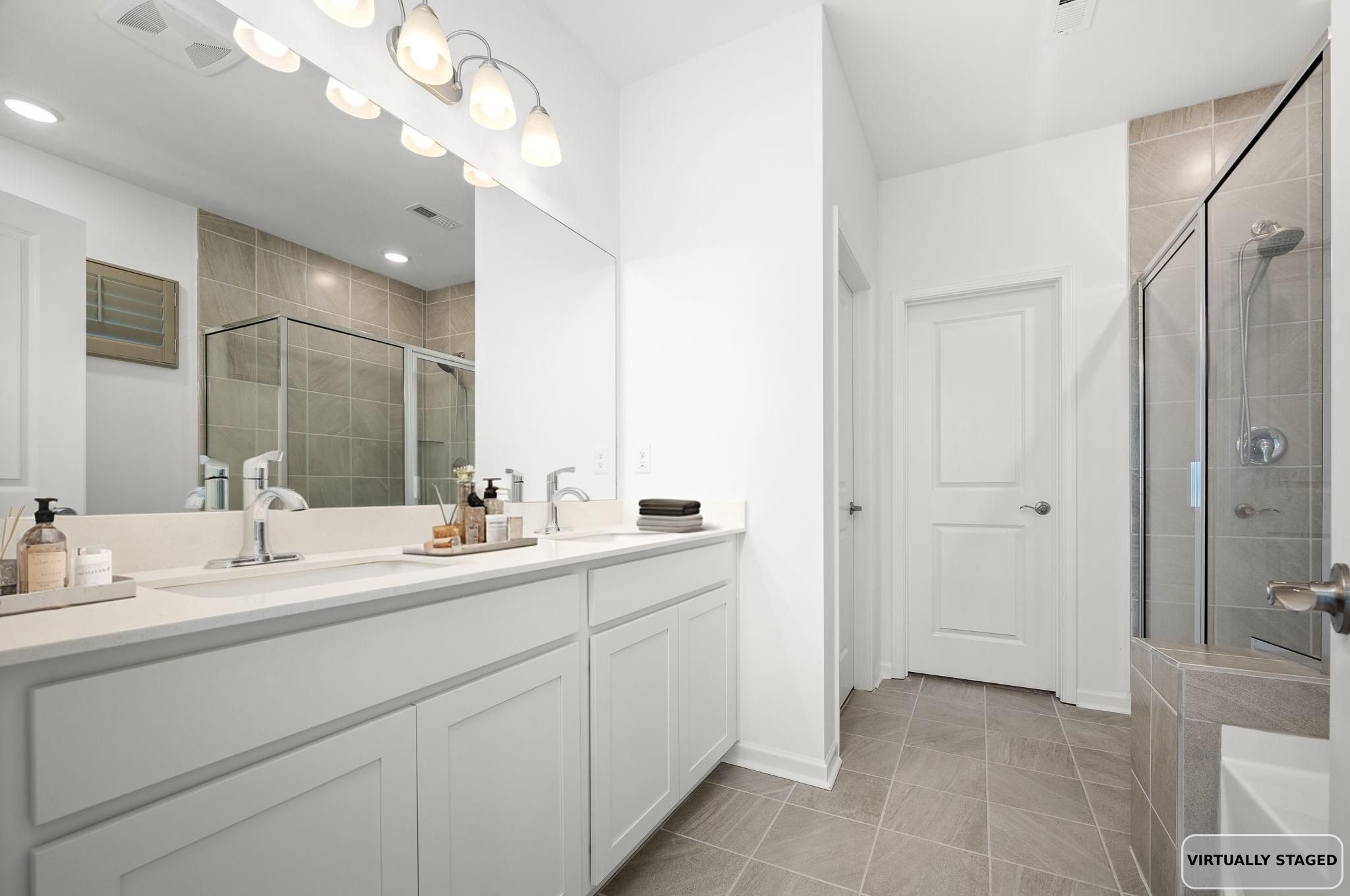 3250 Hearth Hollow Road Columbia, TN 38401 - Photo 9 of 36 a bathroom with a double vanity sink mirror and double