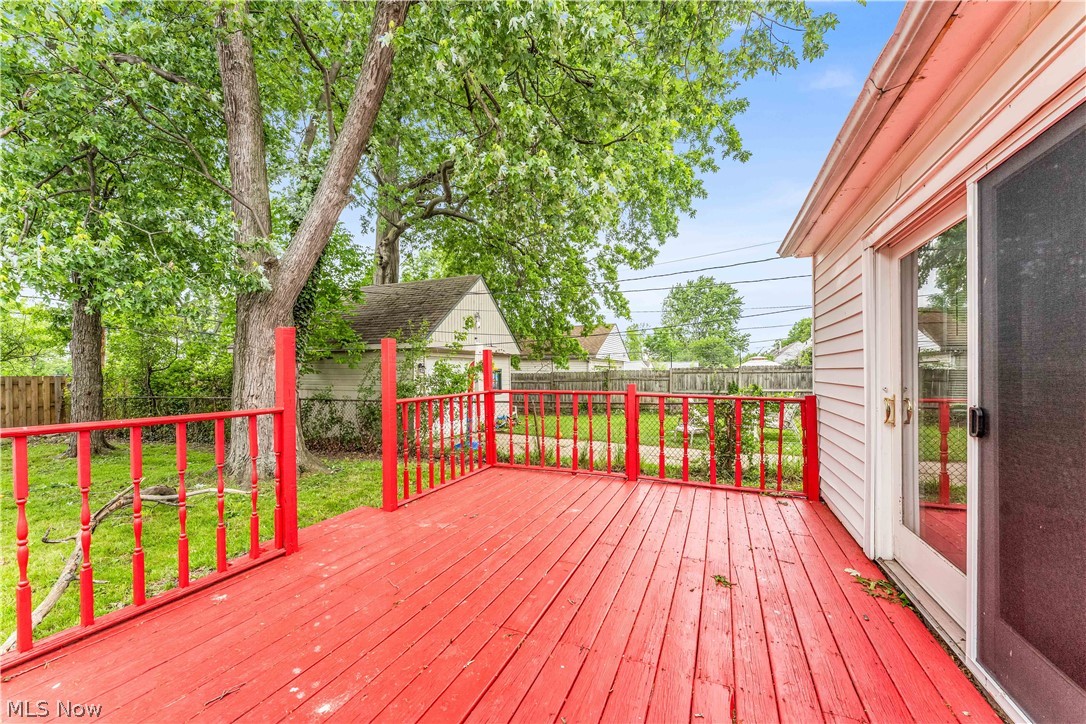 18517 Homeway Road Cleveland, OH 44135 - Photo 24 of 29 Exterior deck featuring vibrant red wood flooring and matching railing