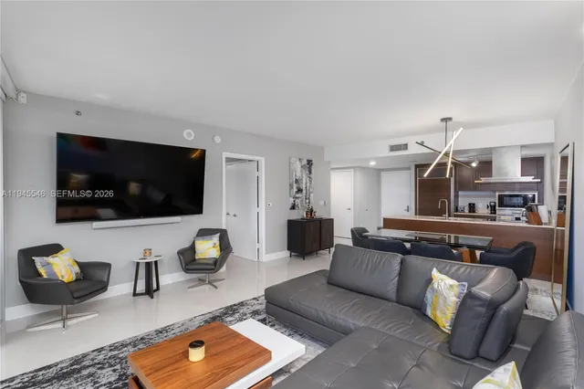 a bathroom with a tub and a view of bathroom